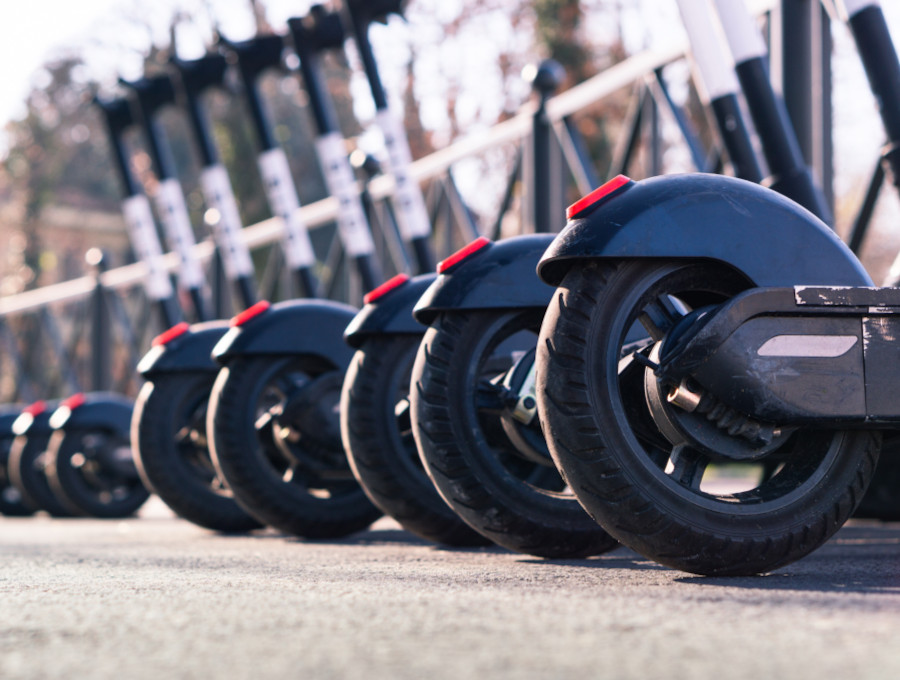 line of electric scooters