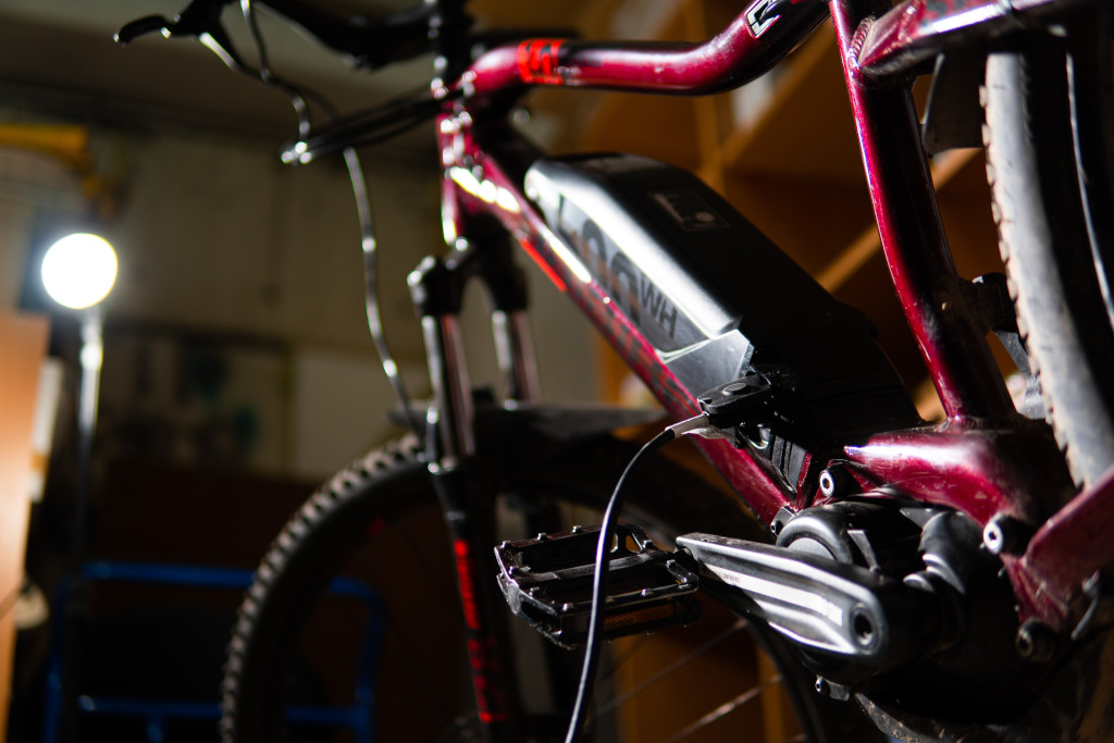 electric bike charging on a stand